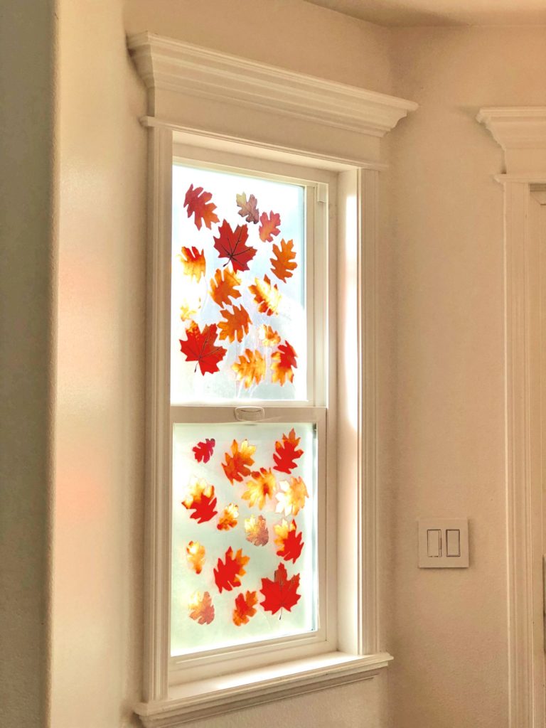 completed fall leaf window suncatcher activity
