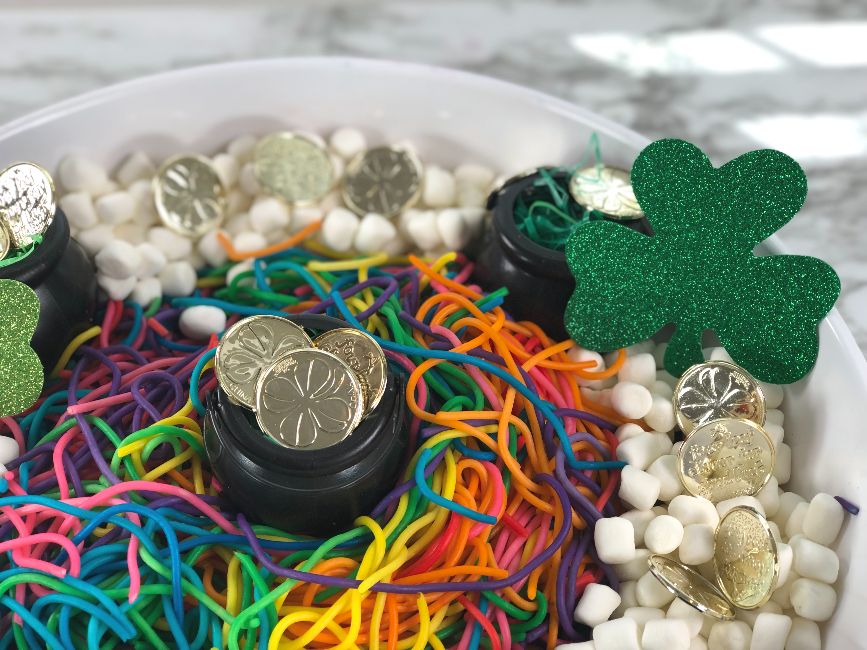 st. patrick's day rainbow dyed spaghetti sensory play marshmallow shamrock