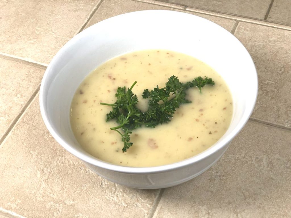 potato and leek soup with parsley garnish