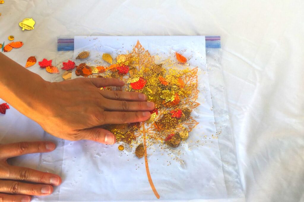 Completed fall leaf fall sensory bag activity for toddlers